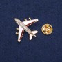 Broche « Avion » 27×30 mm, bande marron, couleur métal or