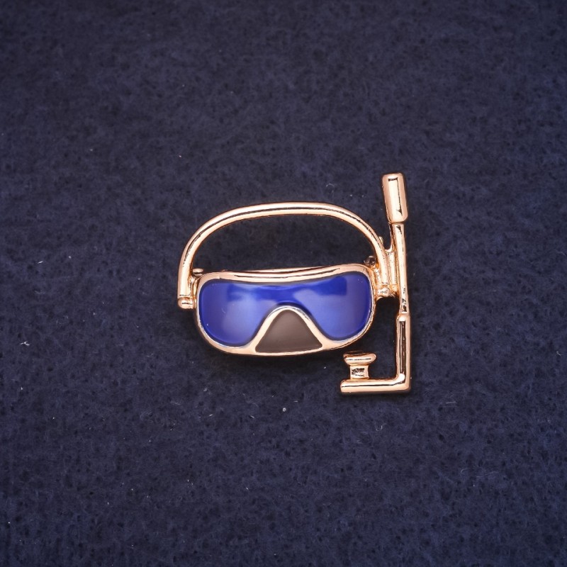 Broche Masque 30×28 mm émail couleur marron et bleu, métal doré