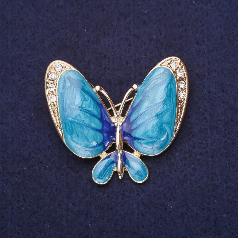 Broche Papillon, strass blancs, émaillé bleu clair, 36×42 mm, métal jaune