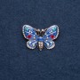 Broche «Papillon» émail bleu 25×38 mm couleur métal doré