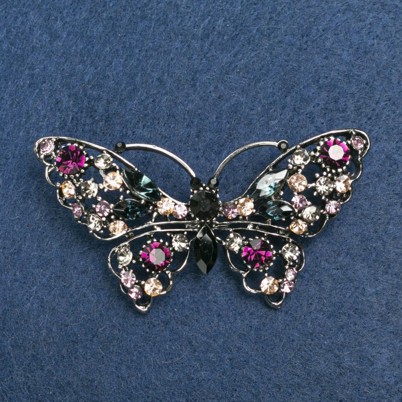 Broche papillon, strass multicolores, métal argenté 70 × 39 mm