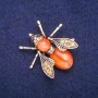Broche «Papillon» avec œil de chat orange et strass 33×34 mm, métal doré