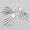 Pendentif — Accessoire de bijouterie «Squelette de la main» 35×18 mm, conditionnement 9 pièces, ±20 g.