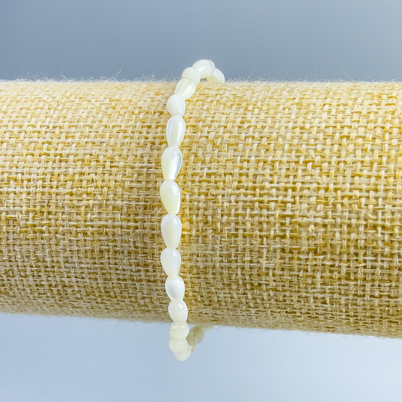 Bracelet en perles de nacre, diamètre 4×7 mm, longueur 18 cm (élastique)