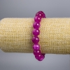 Bracelet «Tourmaline» (artificiel) perles framboise, diamètre environ 10 mm, longueur 18 cm, élastique