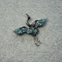 Broche grue noire et émail vert, métal argenté 47 × 45 mm